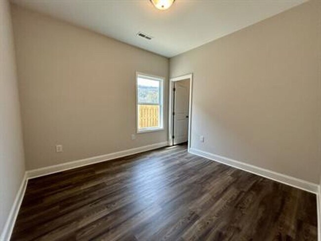 Building Photo - Relax & Unwind in This Peaceful 4 Bedroom ...