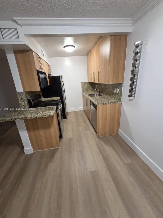 Building Photo - 1125 NE 16th Pl