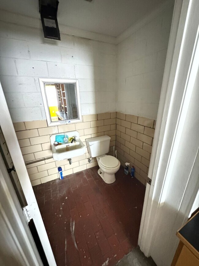 Building Photo - Prime Commercial Space for Rent in Downtown Granite Quarry - 1,323 Sq Ft with Bay Doors