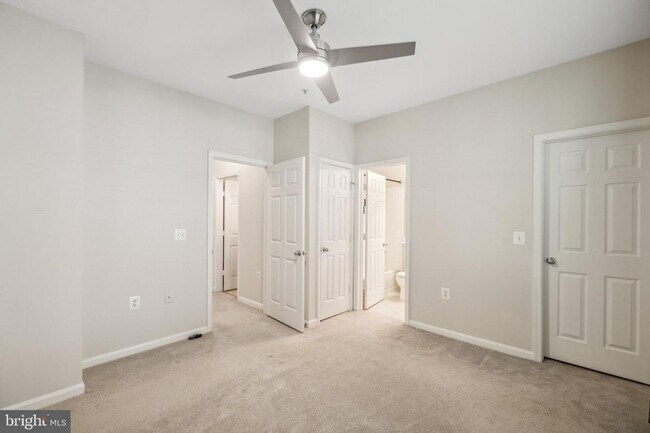 Building Photo - This townhouse style condo is located across the street from the Vienna Metro Station (Orange Line).