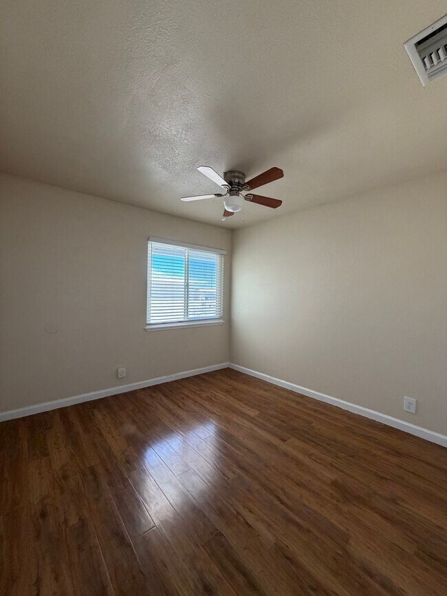 Building Photo - 3 Bedroom 2 Bathroom House with Central A/C , 2 Car Garage and Beautiful Backyard with Covered Patio