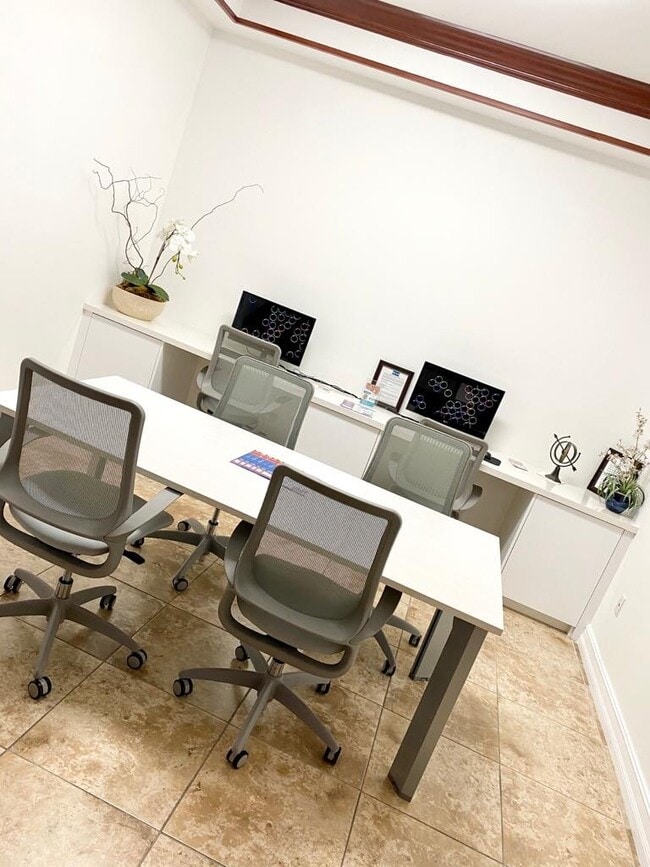 Building Photo - Rare 2/2 Corner Penthouse with Panoramic Lagoon Views from Every Room – Available Now!