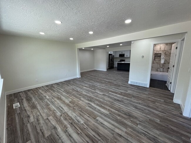 Building Photo - Beautifully Renovated 4-Bedroom Home with Finished Basement