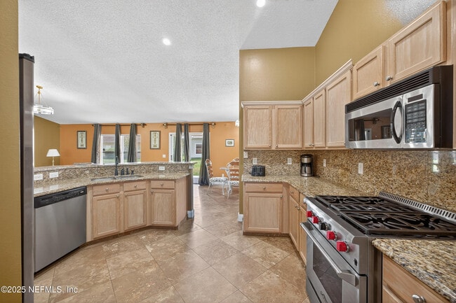 Building Photo - 10375 Woodley Creek Blvd