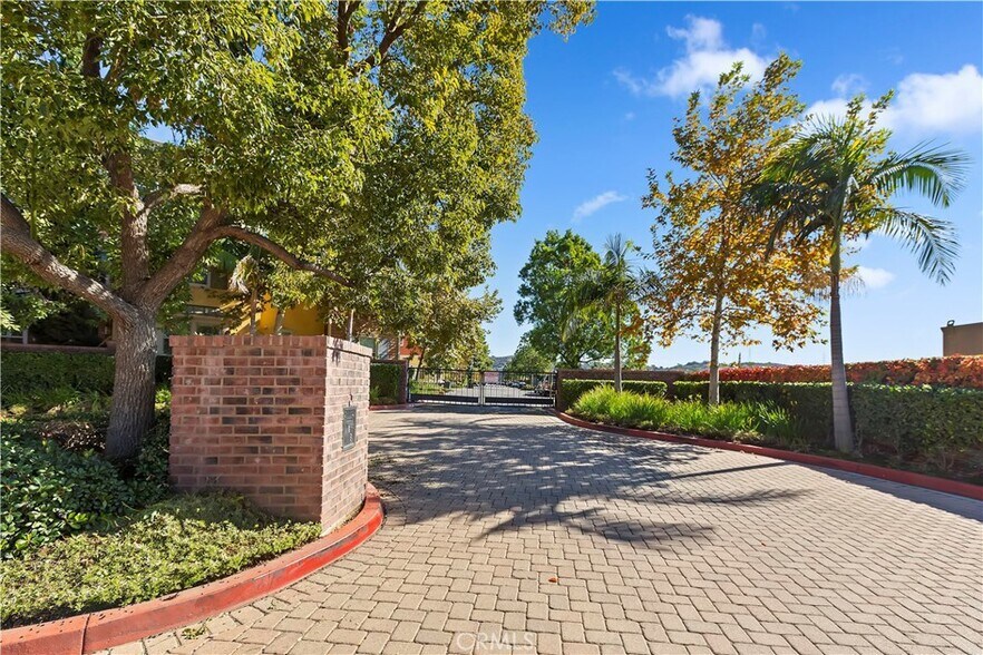 Parking gate entry - 335 S Glendora Ave