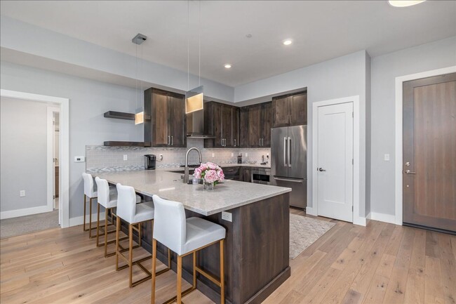 Building Photo - COME HOME TO REFINED DOWNTOWN LUXURY CONDO...