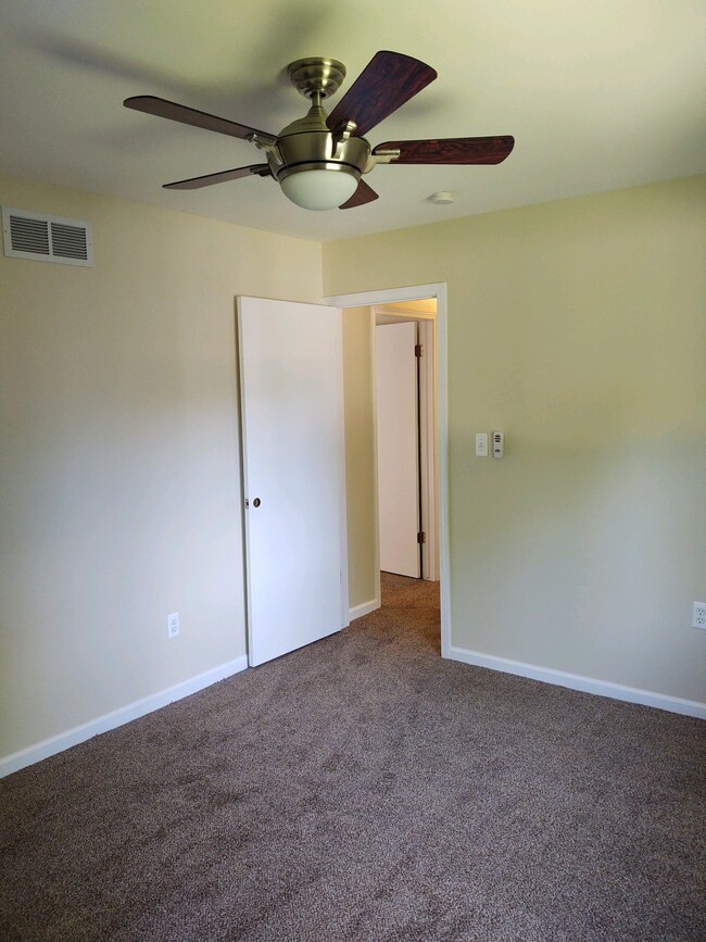 Master bedroom, including ceiling fan with remote control - 41247 S. Woodbury Green Dr.