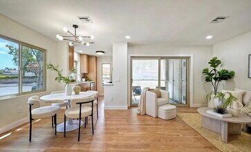 Building Photo - Stunning corner-unit condo in prime West M...