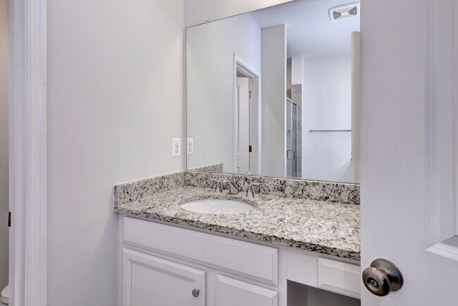 Building Photo - Three Story Brick End Unit with Rooftop Terrace