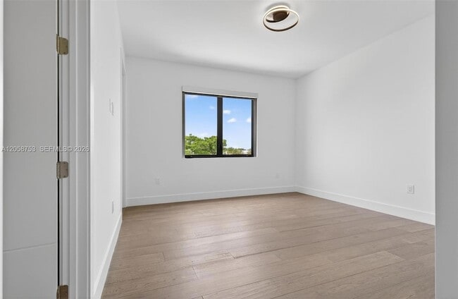 Building Photo - 16709 Botaniko Dr N