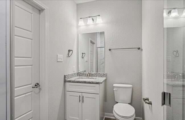 Building Photo - "Charming 3-Bedroom Duplex in San Antonio with Granite Elegance!"