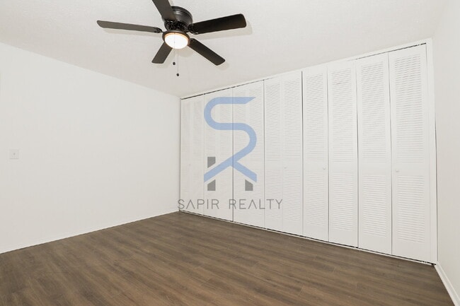 Building Photo - Move in before December 31st and choose your reward: a $250 Amazon Gift Card or a 55" Smart TV!