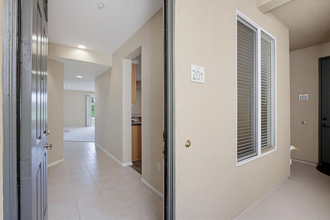 Building Photo - Carlsbad Condo West of 5 Freeway with Lagoon Access - Available Now!