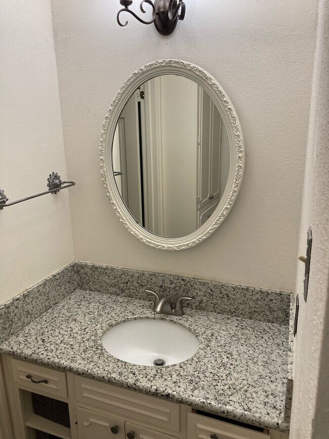 Building Photo - Maintenance free living in this updated condo