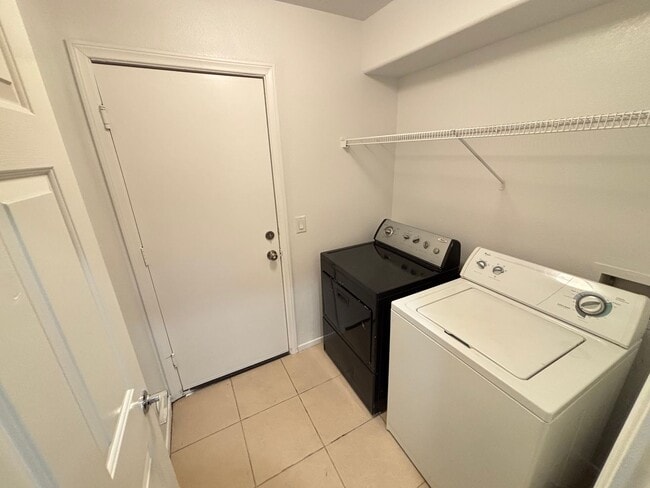 Building Photo - Spacious Tri-Level 4-Bedroom Home with Bal...