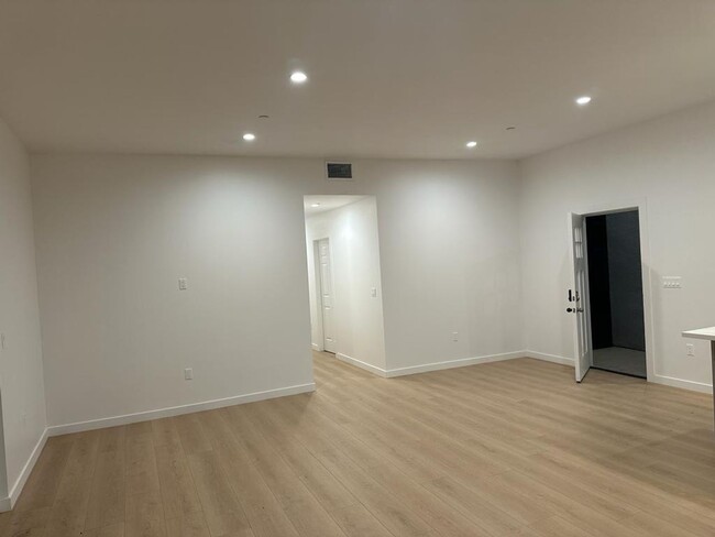 Building Photo - 9308 E Ave T 6