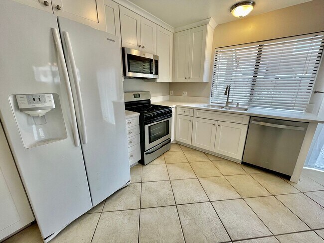 Building Photo - Discover the Essence of Irvine Living!