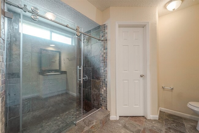 Building Photo - 15910 Tumbling Rapids Dr