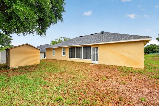 Building Photo - Available Now! Move-In Ready 3BR Home with Florida Room & Shed