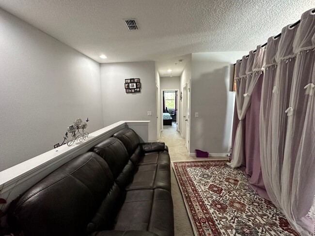 Building Photo - Lease this 3BR End-Unit Townhome in Gated Community with Water View!