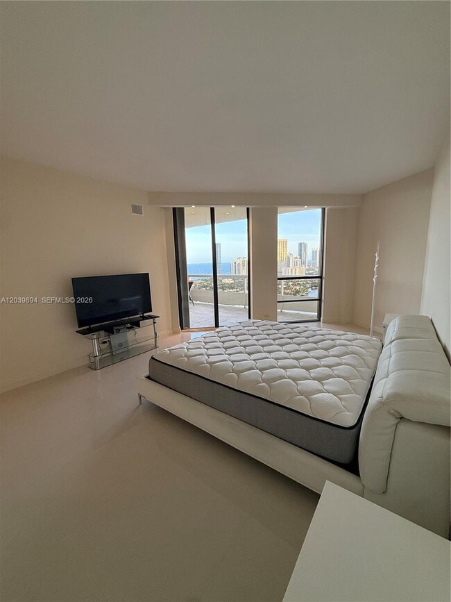 Building Photo - 20191 E Country Club Dr
