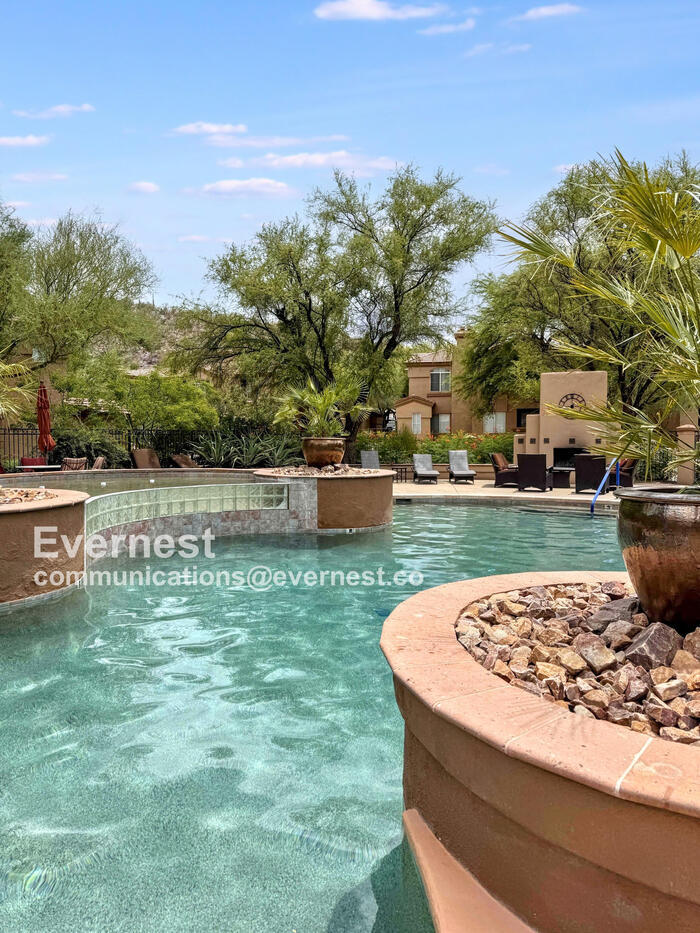 Building Photo - 7050 E Sunrise Dr