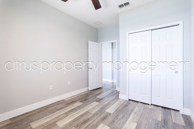 Building Photo - Stunning Double Waterfront 4/3 Home with Dock and Electric Boat Lift