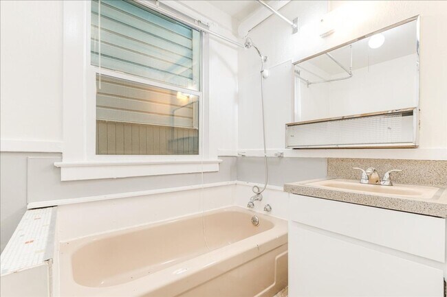 Building Photo - Spacious, Charming Victorian Style Tri-Ple...