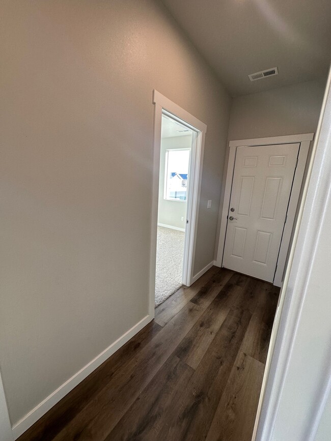 hallway into bedroom - 4081 Quinn Dr NE