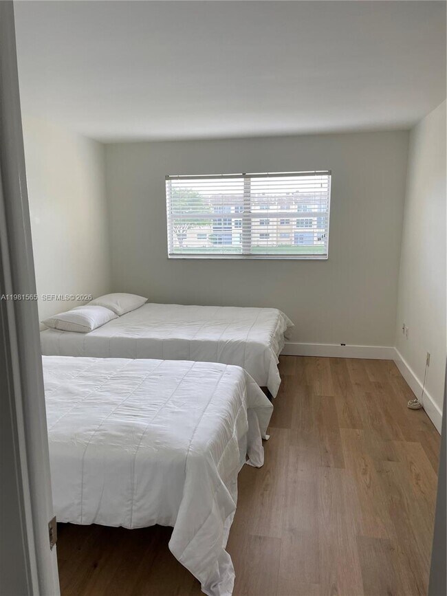 Building Photo - 8465 Sunrise Lakes Blvd