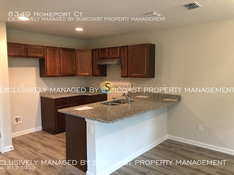 Building Photo - 8349 Homeport Ct