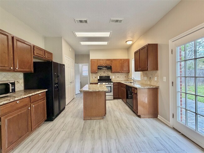 Building Photo - 6315 Laurel Bush Ln