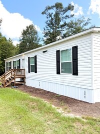 Building Photo - 5250 Hummingbird Ln