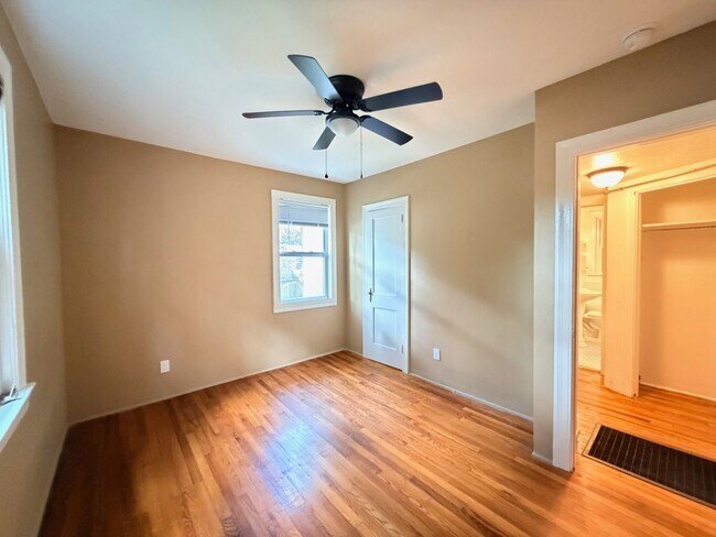 Building Photo - Historic Downtown Charm | Original Floors | Walk to Golf, Dining, Parks, & Concerts