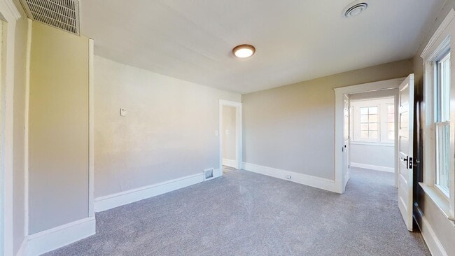 Building Photo - 7408 Dudley Ave