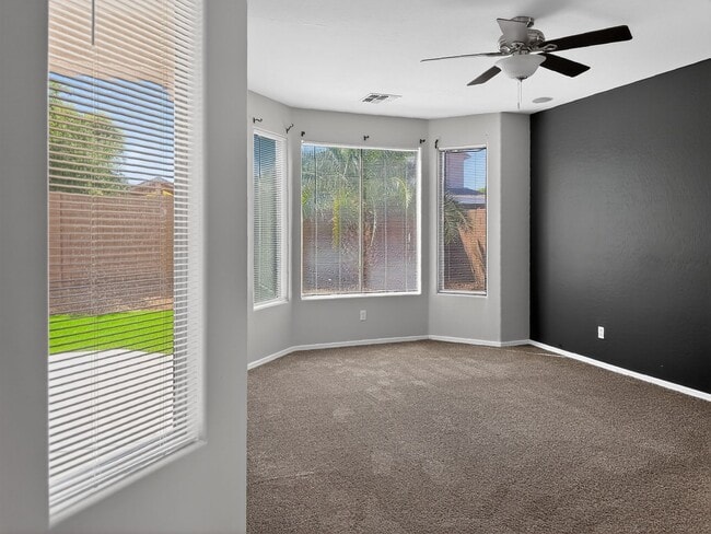 Building Photo - Single-level 4 bed, 2 bath home with tandem 3-car garage and RV gate.