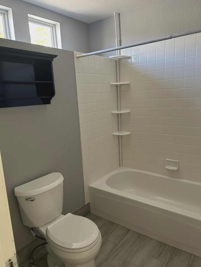 Building Photo - Welcome to this STUNNING 4-bedroom, 2.5-ba...