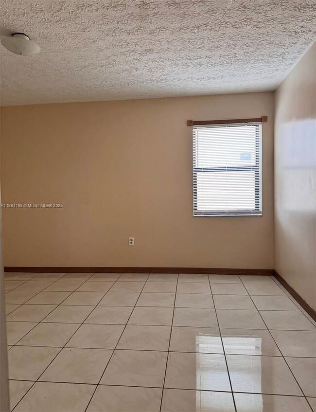 Building Photo - 6055 W 19th Ave