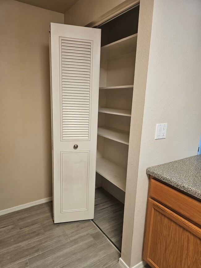 Building Photo - Great 3/2 in NE Phoenix with brand new flo...