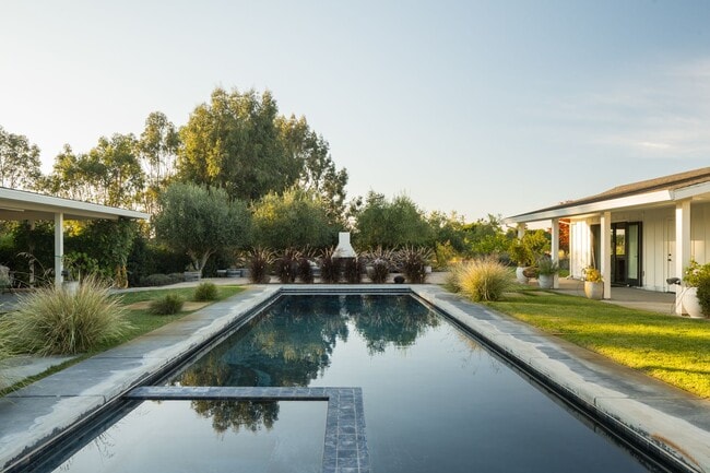 Building Photo - PURE Property Management Presents