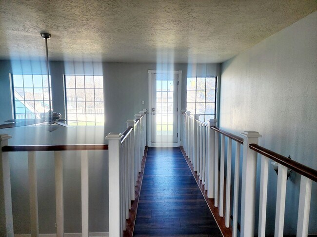 Building Photo - Three Bedroom Charming Neighborhood