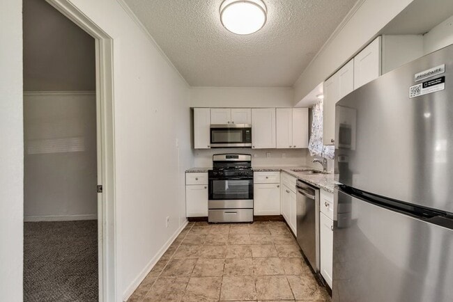 Building Photo - 7704 Woodspan Dr
