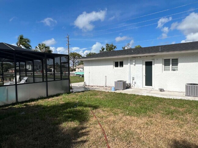 Building Photo - Charming 1-Bed Retreat Waterfront W/Pool W...