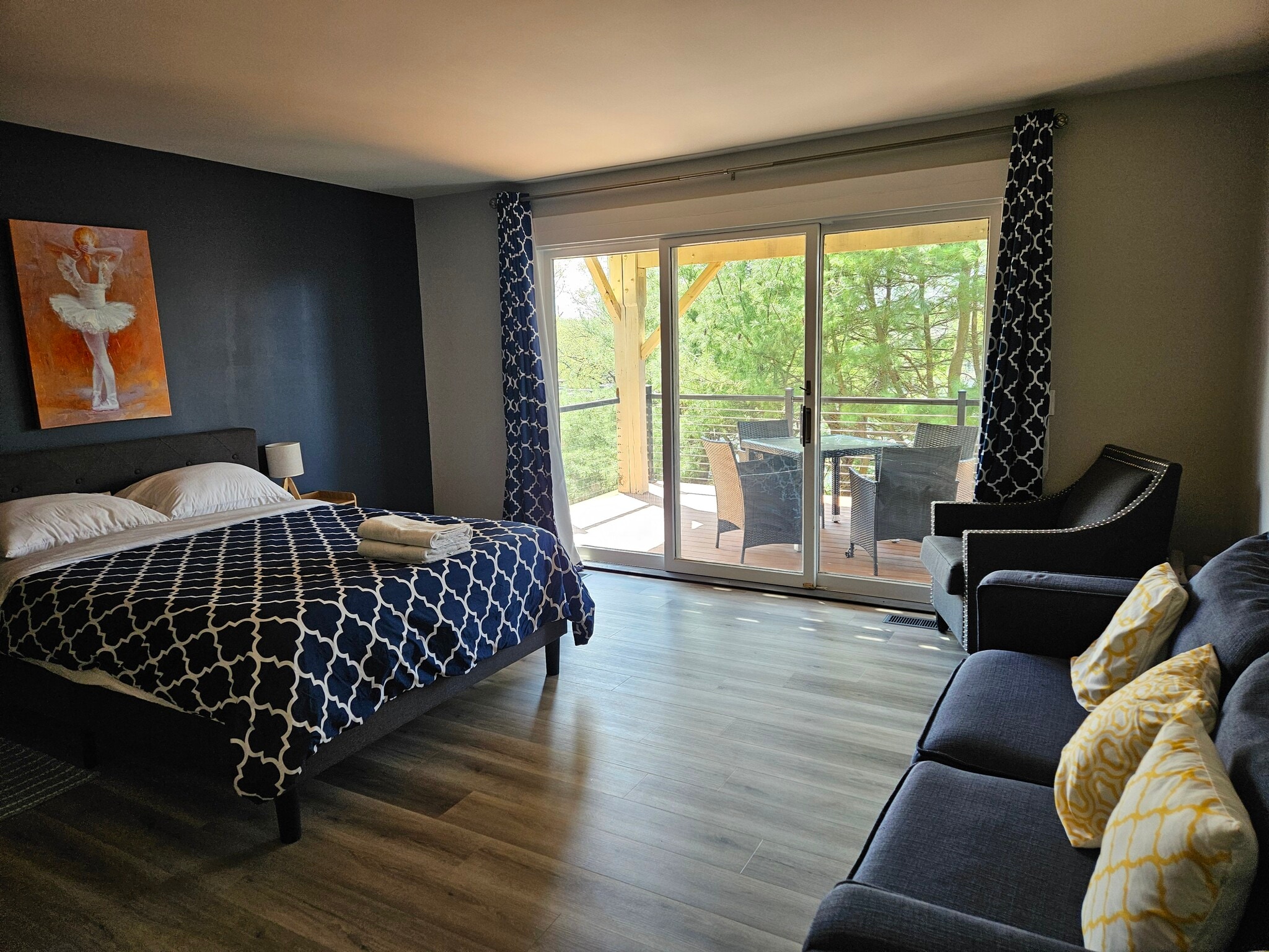 sofa and balcony with a view - 4654 Charleston Ter NW