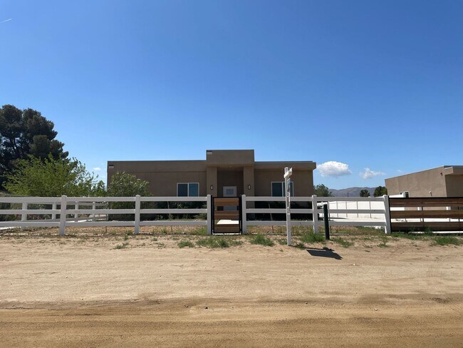 Building Photo - 9308 E Ave T 6
