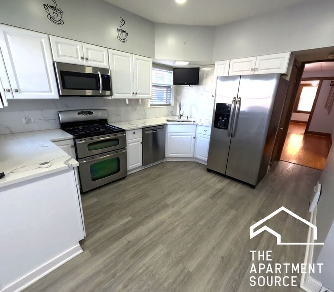 Building Photo - 3117 N Mango Ave