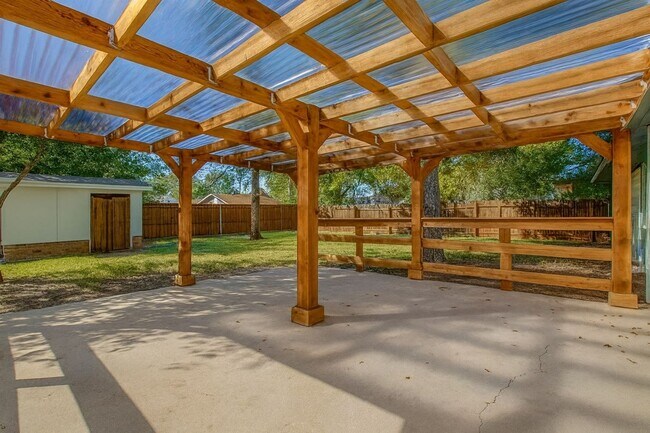 Building Photo - Shaded Wylie Charmer with Fireplace & Covered Patio Comfortable 3-Bed Living