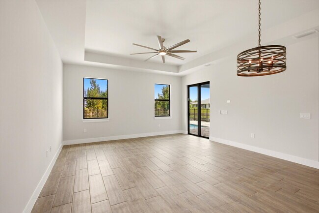 Building Photo - Brand New Canal-Front Pool Home for Rent, 3/2/2, NE Cape Coral. The Builder Didn't Cut Corners, S...