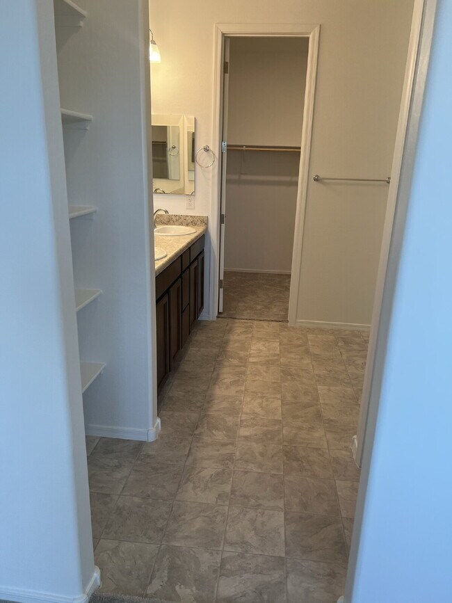 Building Photo - 4 BEDROOM RENTAL WITH 3 CAR GARAGE IN LOS PORTALES CASA GRANDE ARIZONA