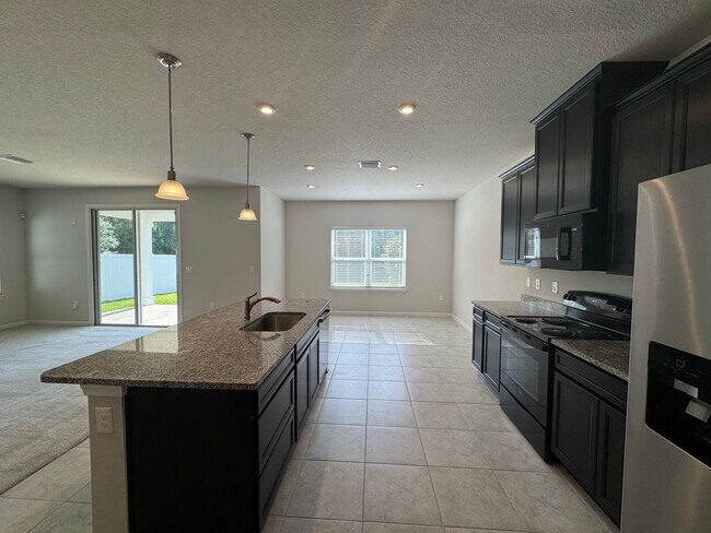 Building Photo - Ready Now: Panther Creek Two-Story Single Family Home